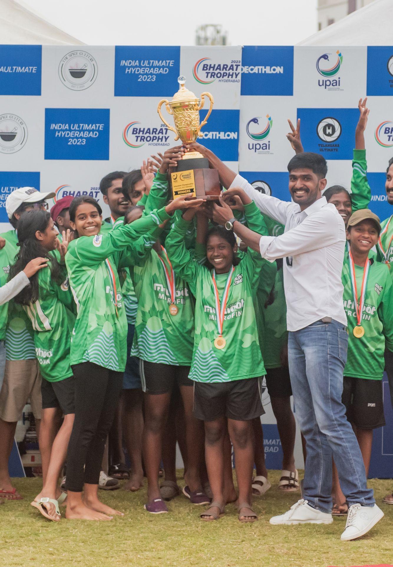 The Kerala team lifting the Spirit of the Game trophy