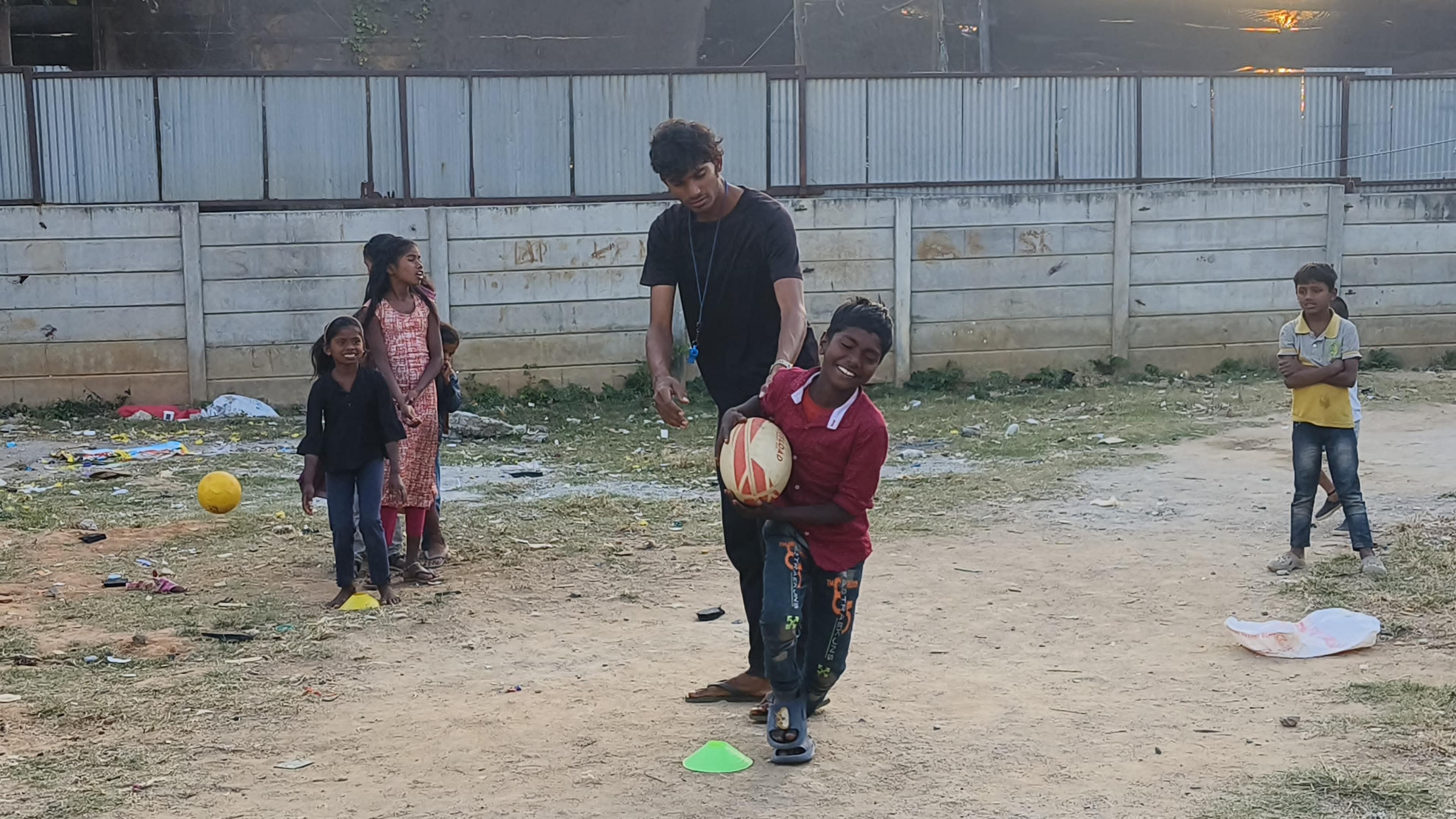 Children playing a ball game together