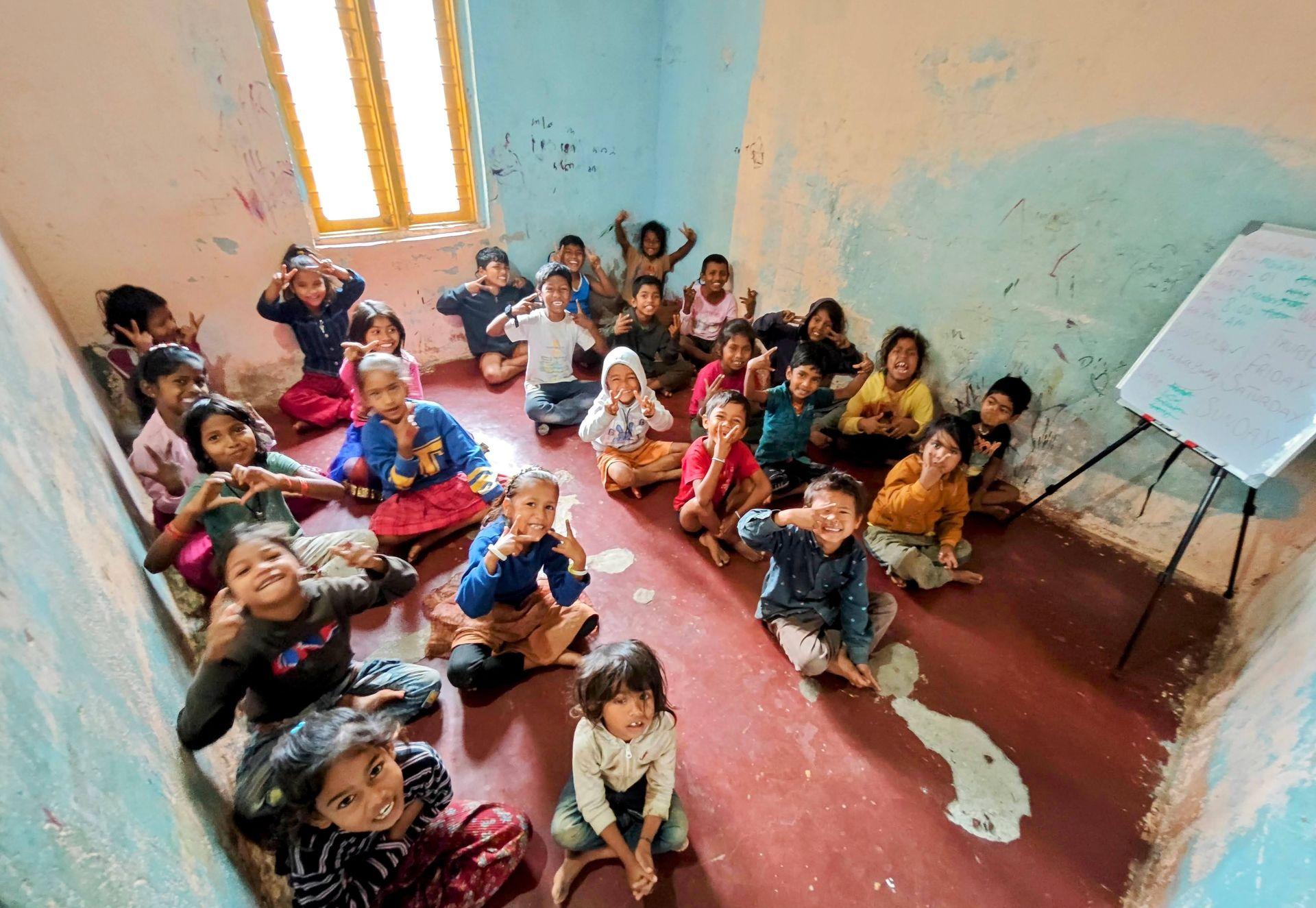Children sitting together in an informal classroom circle